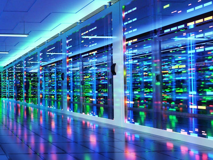 Long hallway of servers, glowing in the dark
